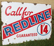 An enamel Redline sign